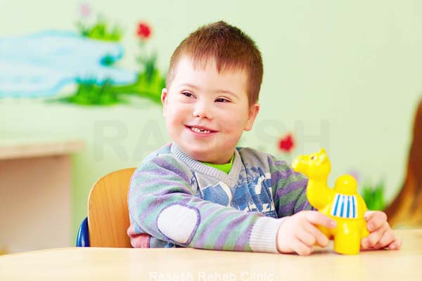 down syndrome kid playing
